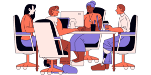 Group of people sitting on office table